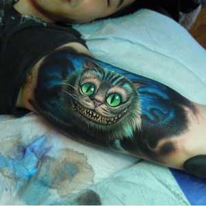 `Cheshire Cat` - tetovaža s pozitivnim značenjem za optimistične ljude