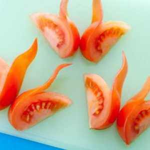 Pojedinosti o tome kako lijepo izrezati rajčice i krastavce