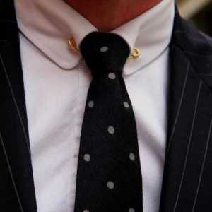 Zlatni pin za kravata: dodatak ili nužnost?